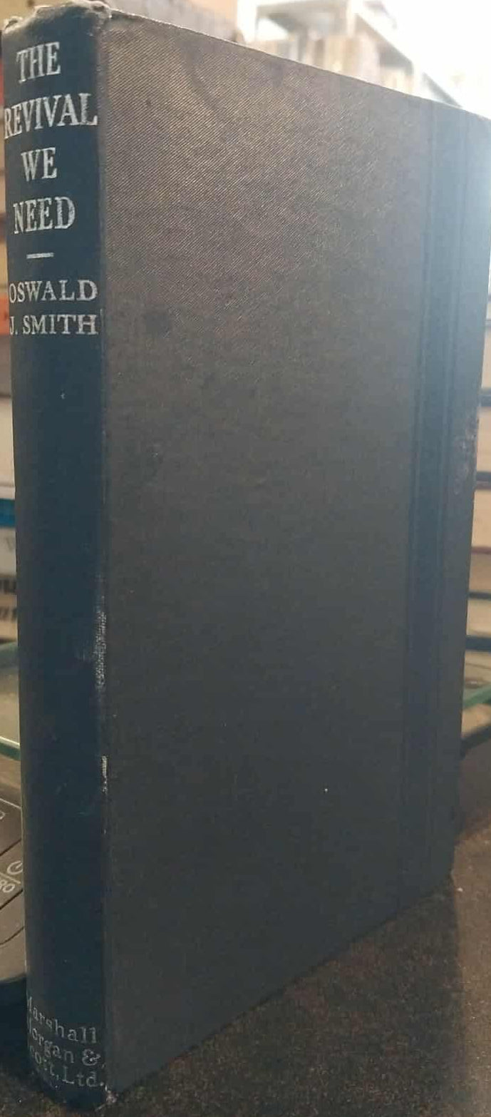 Book titled 'The Revival We Need' by Oswald J. Smith on a shelf with other books.