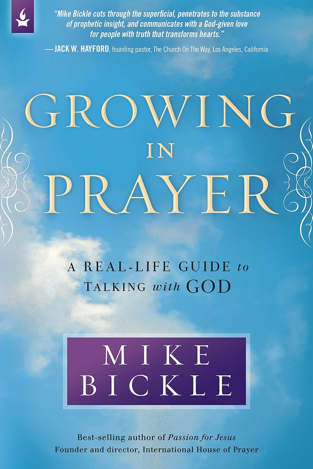 Book cover of 'Growing in Prayer' by Mike Bickle with a blue sky and clouds background.