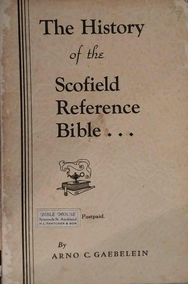 Book titled 'The History of the Scofield Reference Bible' by Arno C. Gaebelein on a dark background