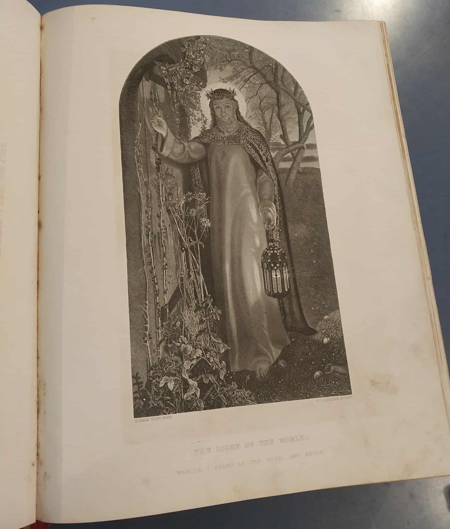 Vintage book page with an engraved illustration of a woman and child in a natural setting.