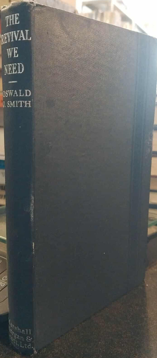 Book titled 'The Revival We Need' by Oswald J. Smith on a shelf with other books.
