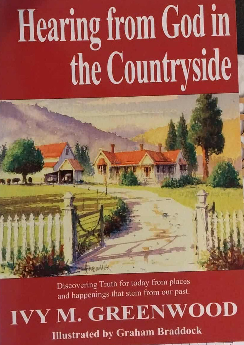 Book cover of 'Hearing from God in the Countryside' by Ivy M. Greenwood on a table.