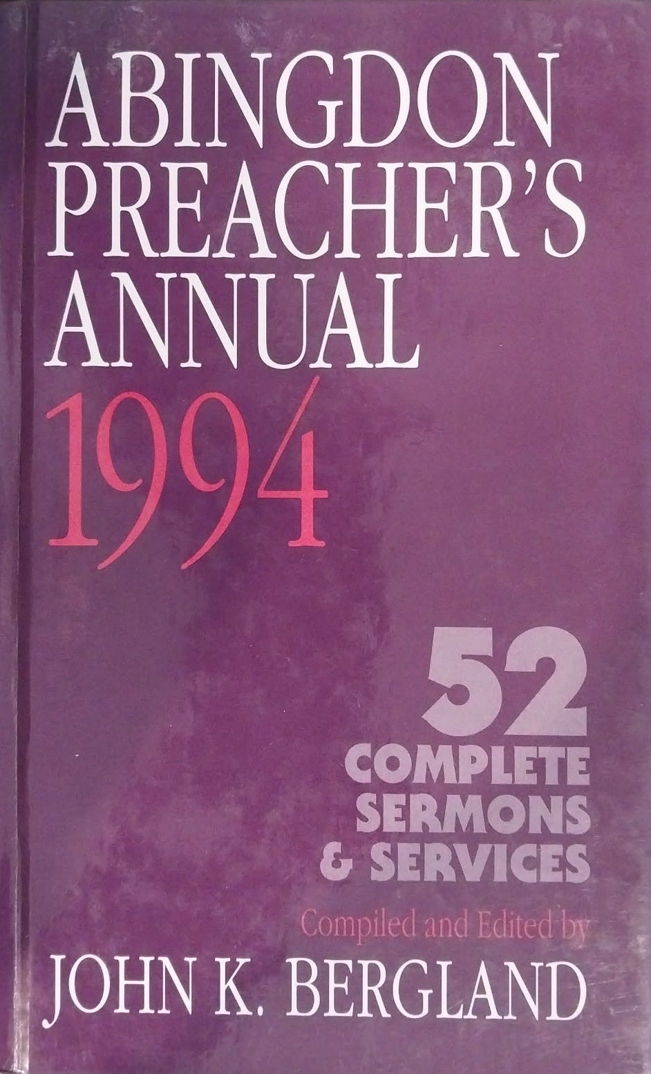 Purple book titled 'Abingdon Preacher's Annual 1994' on a dark background
