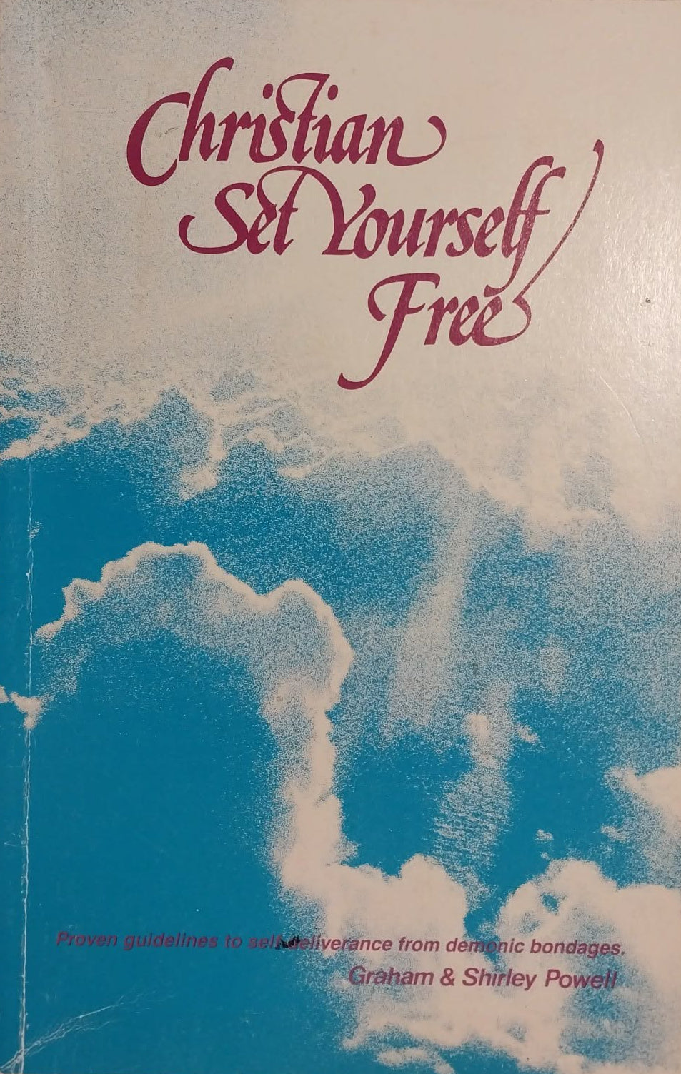 The front cover of the book 'Christian Set Yourself Free' by Graham and Shirley Powell, featuring a blue sky and white clouds design with red script text.