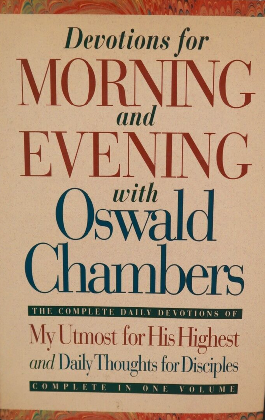 A hardcover book titled 'Devotions for Morning and Evening with Oswald Chambers' on a dark background. The cover is cream-colored with large red and dark blue text and a decorative multicolor border at the top and bottom.