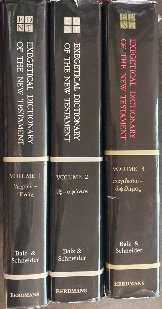 Three books titled 'Exegetical Dictionary of the New Testament' by Balz & Schneider on a wooden surface.