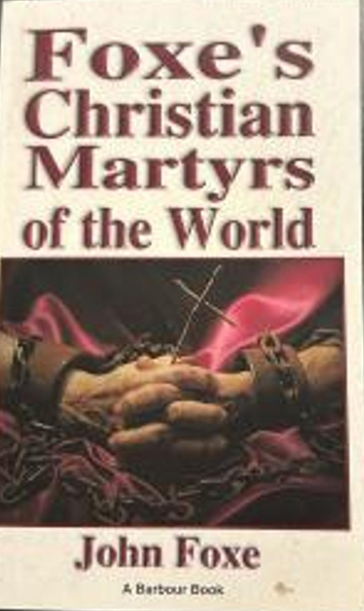 Book cover of 'Foxe's Christian Martyrs of the World' by John Foxe on a dark surface.