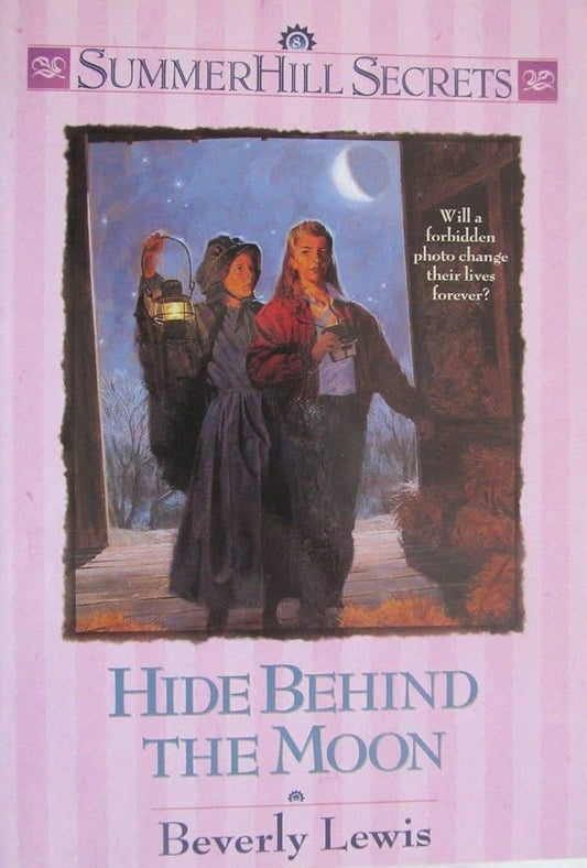 Book cover for 'Hide Behind the Moon' by Beverly Lewis, part of the SummerHill Secrets series. The cover is light pink with a central illustration of two women in historical dress under a crescent moon, and the title is printed in blue text at the bottom.