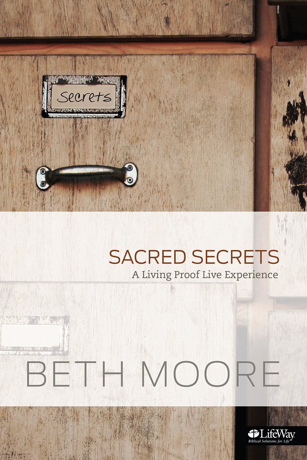 Cover of 'Sacred Secrets' by Beth Moore with a wooden box labeled 'Secrets'.