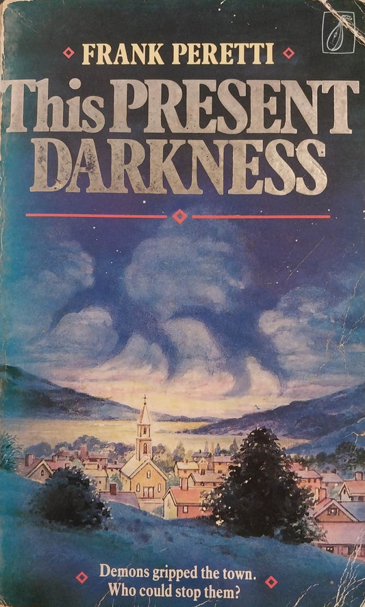 This Present Darkness by Frank E. Peretti image 0