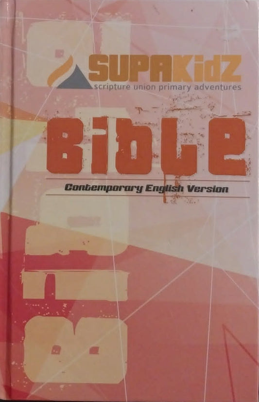 Supakidz Bible on a dark surface with a keyboard in the background