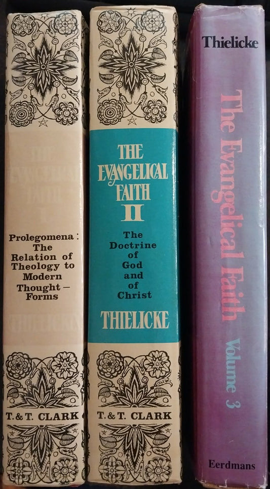 Three vintage theological books standing upright on a black keyboard. The left book is cream with black floral border and gold text; the middle book has a turquoise center panel with gold text and cream borders; the right book is purple with gold text.