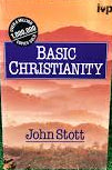 The front cover of the book 'Basic Christianity' by John Stott, published by IVP, displayed against a green grass-like background.