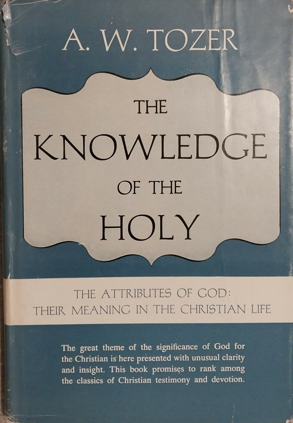 A vintage paperback book titled 'The Knowledge of the Holy' by A. W.