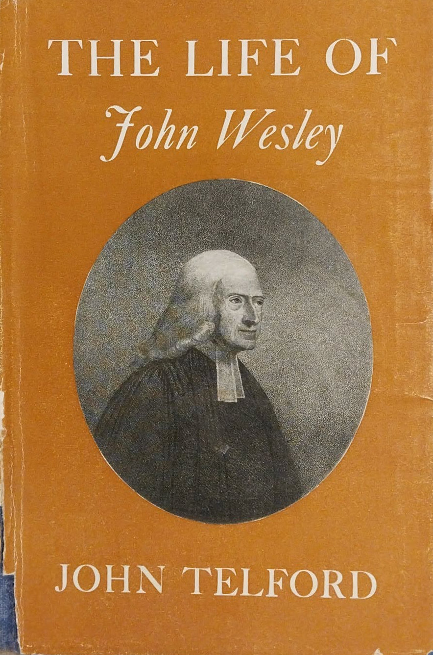 A vintage hardcover book titled 'The Life of John Wesley' by John Telford, featuring a tan cover with a circular black-and-white portrait of John Wesley.