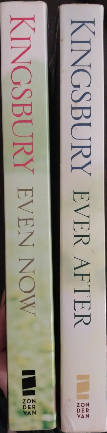 Two books titled 'Kingsbury Even Now' and 'Kingsbury Ever After' on a dark surface.