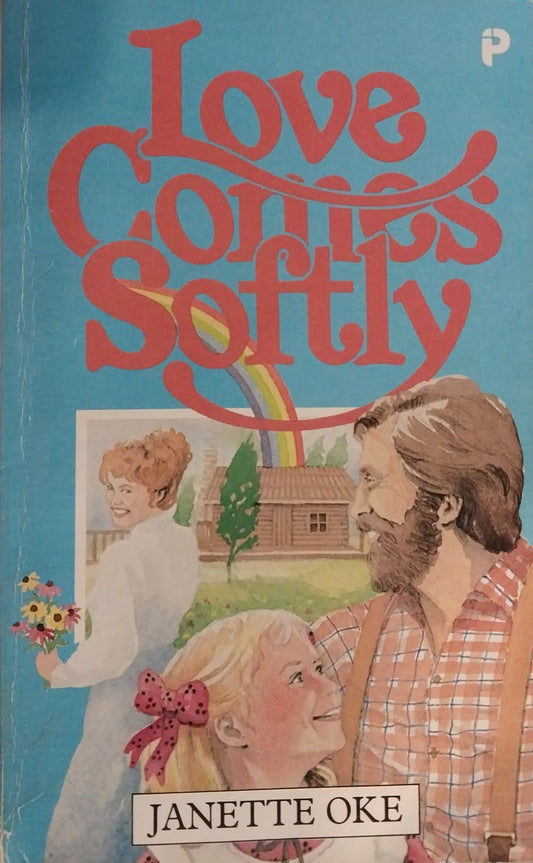 Book cover of 'Love Comes Softly' by Janette Oke with a man, woman, and child illustration on a blue background.