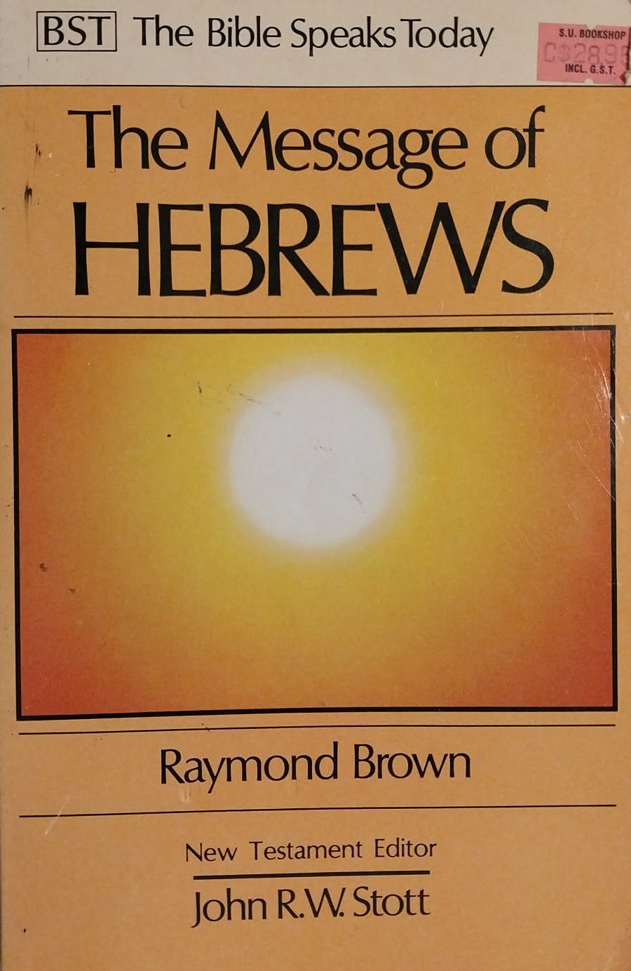 The Message of Hebrews paperback book by Raymond Brown, published by BST, featuring a yellow and orange cover with a central sun graphic.