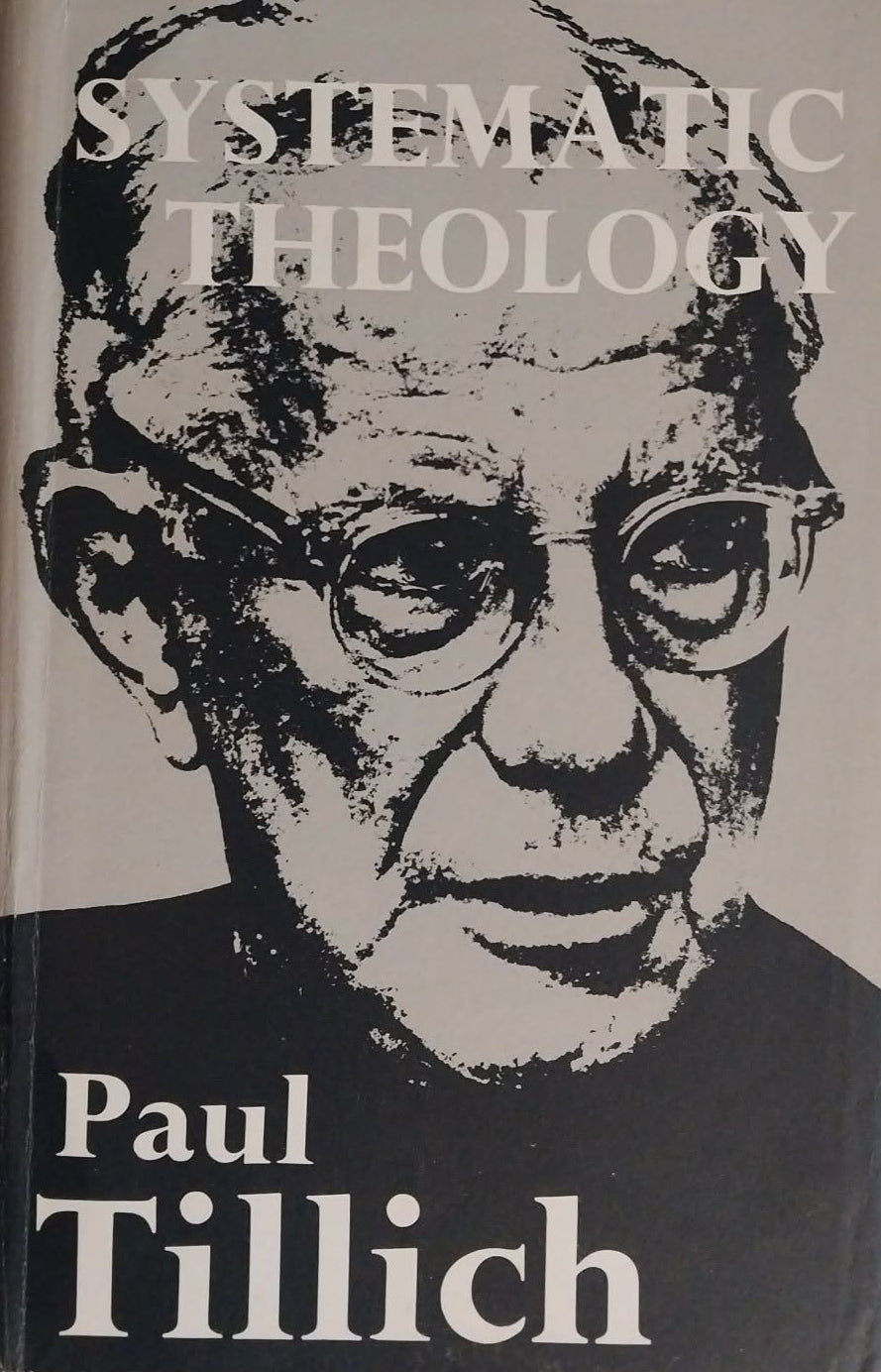 A hardcover book titled 'Systematic Theology' by Paul Tillich, featuring a black-and-white illustrated portrait of the author on the cover, photographed against a dark textured background.