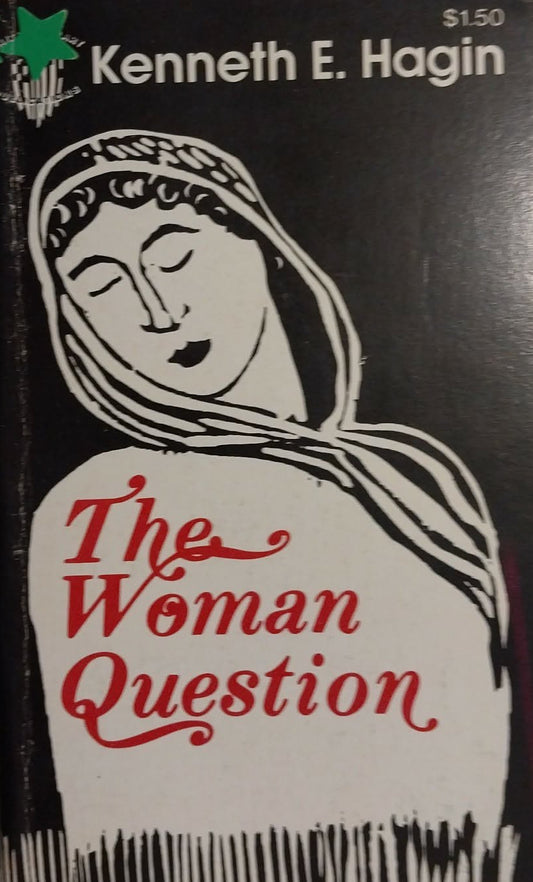 A vintage paperback book of 'The Woman Question' by Kenneth E. Hagin, featuring a black and white illustration of a woman with red title text, photographed on a gray textured surface.